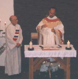 Pat Graybill assists Fr. Mike Depcik